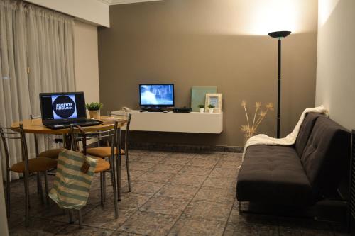 TV a/nebo společenská místnost v ubytování Argenta Apart Hotel