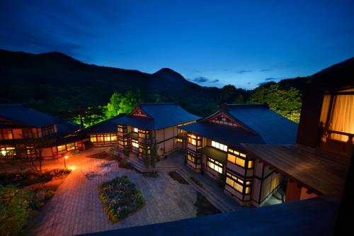 an aerial view of a building at night at Yukaen in Hanamaki