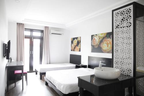 Кровать или кровати в номере Thanh Binh 2 Hotel