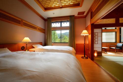 Ένα ή περισσότερα κρεβάτια σε δωμάτιο στο Yukaen