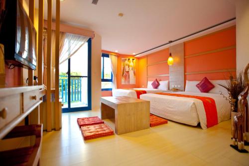Katil atau katil-katil dalam bilik di Golden Sea Inn