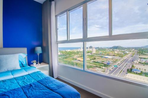 Кровать или кровати в номере Baan Kiang Fah