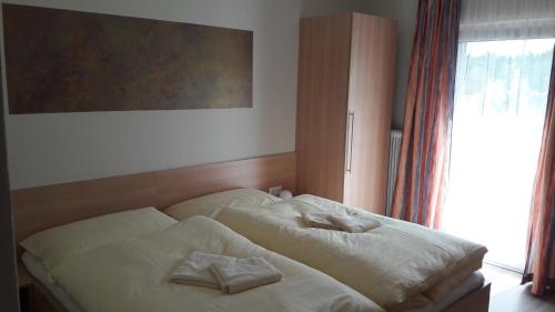 Cama o camas de una habitación en Gasthof Kaiser