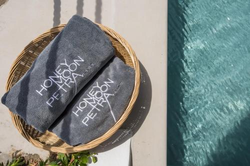 a basket with a napkin on top of it at Honeymoon Petra Villas in Imerovigli