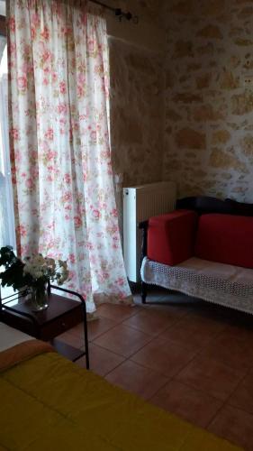 Χώρος καθιστικού στο Artemisia Traditional Home