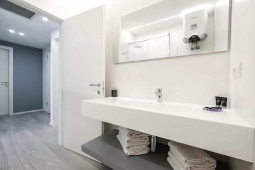 Ett badrum på Bertamini Apartments
