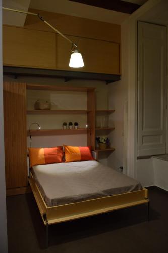 Giường trong phòng chung tại All'Incanto di Mary