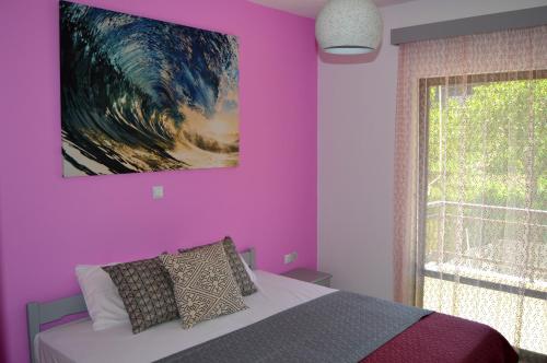 Ένα ή περισσότερα κρεβάτια σε δωμάτιο στο Eva Apartments