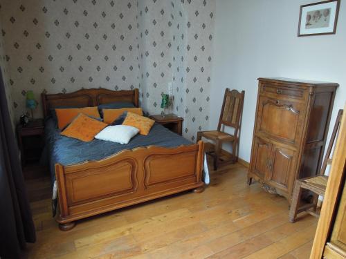 Postel nebo postele na pokoji v ubytování manoir de saint supplix