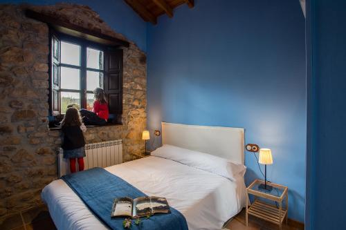 Llit o llits en una habitació de Casa Rural La Torraya