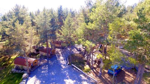an aerial view of a water park with a roller coaster at Camping Pod Heaven in Brackla