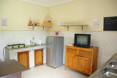 A kitchen or kitchenette at Bikeventures House Uganda