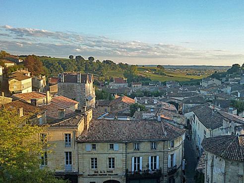 a view of a city with houses and buildings at Fasthôtel - Saint Emilion Est in Montcaret