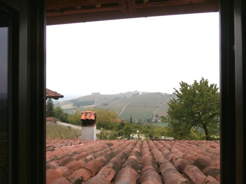 a view from a window of a roof at B&B Rumanot in Dogliani