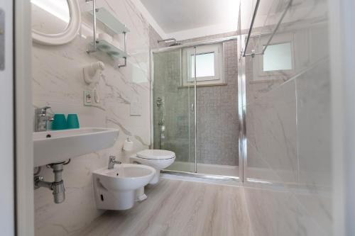 Koupelna v ubytování Residence Parco Lago di Garda
