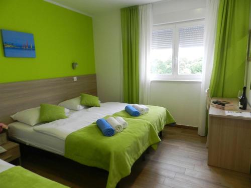 מיטה או מיטות בחדר ב-YourCroatiaHoliday - Villa with 6 rooms