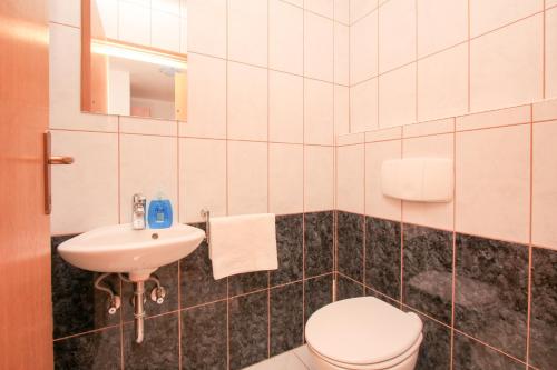 Kúpeľňa v ubytovaní Apartment Empire