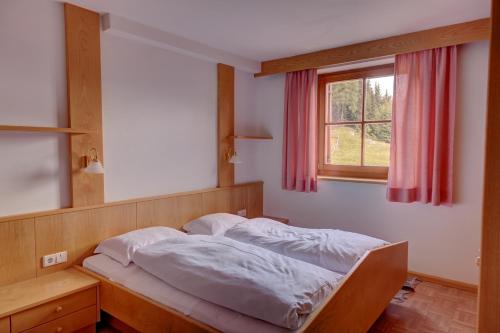 Katil atau katil-katil dalam bilik di Gasthaus Furlhütte