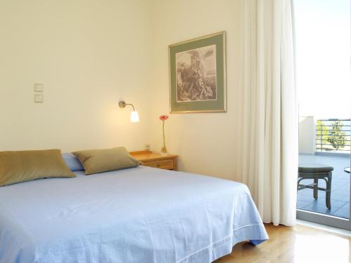 Posteľ alebo postele v izbe v ubytovaní Luxury Villa Trapezia