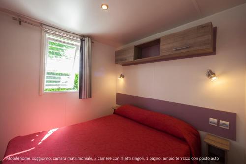 Postel nebo postele na pokoji v ubytování Camping Da Giovanni