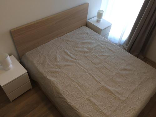 Кровать или кровати в номере Apartment Palanga