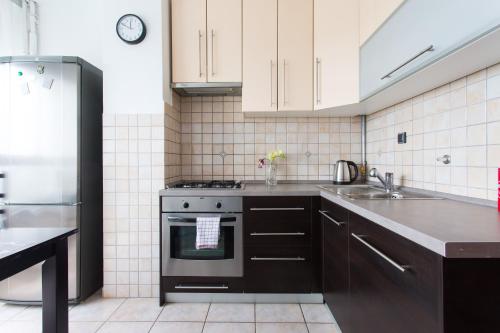 Kuchyň nebo kuchyňský kout v ubytování Apartment Bonbon