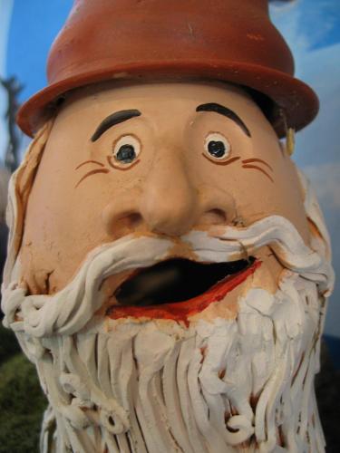 a statue of a man wearing a hat at Märchenhotel 3 Sterne Superior Waldpension Nebelstein in Harbach