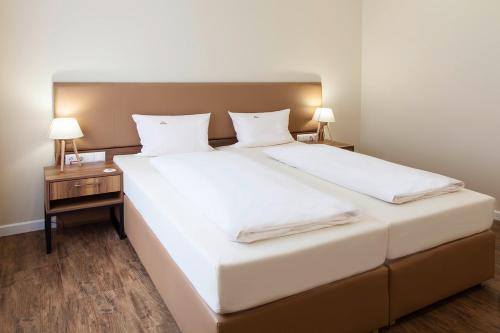 Hotel Engelbertにあるベッド