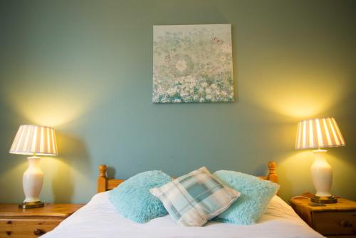 Katil atau katil-katil dalam bilik di Compton Guest House