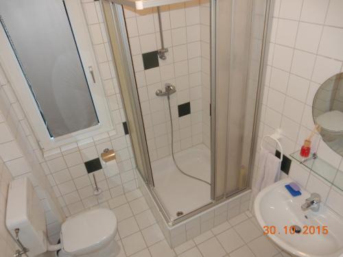 Ванна кімната в Pension Harleshausen