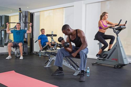 a group of people exercising in a gym at Warwick Paradise Island Bahamas - All Inclusive - Adults Only in Nassau