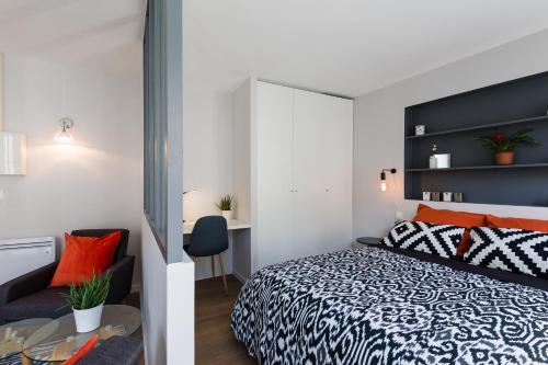 Voodi või voodid majutusasutuse Stay Appart Hotel Lille Centre toas