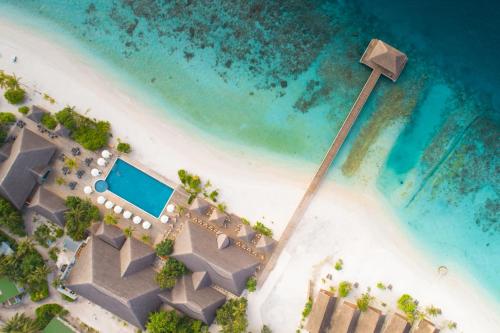 an aerial view of a resort on a beach at Kudafushi Resort & Spa in Raa Atoll