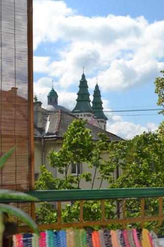 a view of a building with towers in the background at Catedra View Apartment in Ternopil