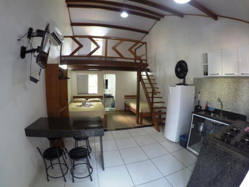 Virtuvė arba virtuvėlė apgyvendinimo įstaigoje Recanto da Ilha
