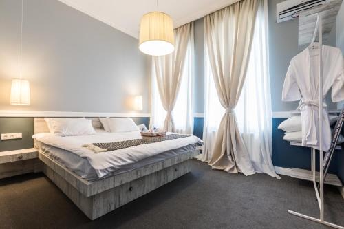 Postelja oz. postelje v sobi nastanitve Kuxos Besiki Apartment