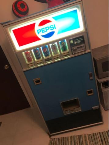 a pepsi machine with a sign on top of it at Walking Distance To Beach And Shops in New Buffalo