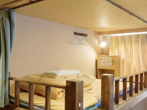 Katil atau katil-katil dalam bilik di Kyoto Hana Hostel