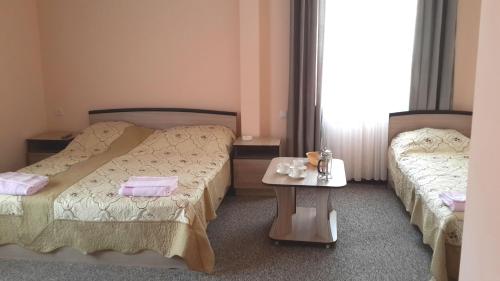 Кровать или кровати в номере Mini-pansionat Maksat