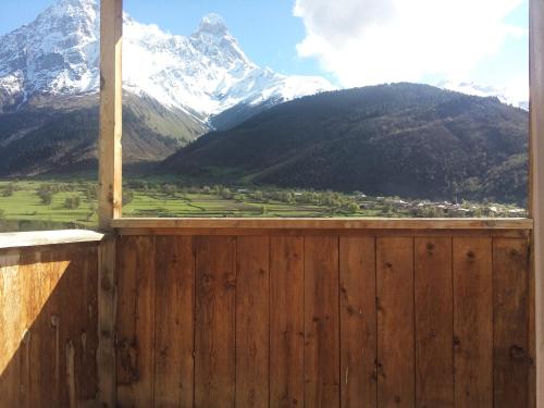 an open window with a view of a mountain at Guest House Murkvam in Tvebishi