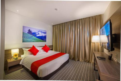 Кровать или кровати в номере Riccarton Capsule Hotel