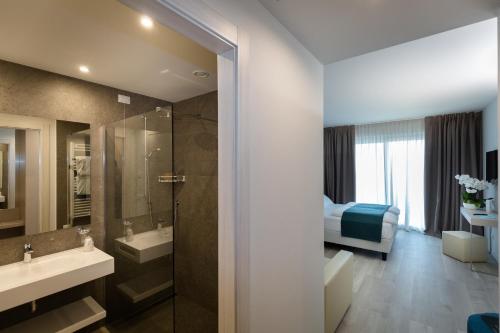 Een badkamer bij Hotel Europa