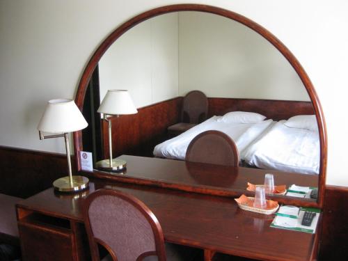 Ένα ή περισσότερα κρεβάτια σε δωμάτιο στο Hotel & Hostel Tallukka