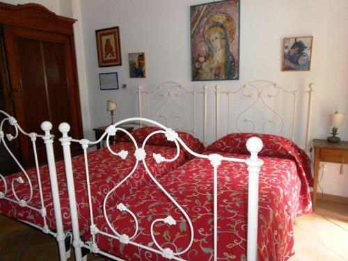 Ένα ή περισσότερα κρεβάτια σε δωμάτιο στο Villa Scimmia