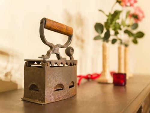 a tool sitting on top of a table with flowers at La Terrazza in Poppi