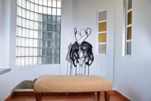 A bed or beds in a room at Quinta Villa Arrabida