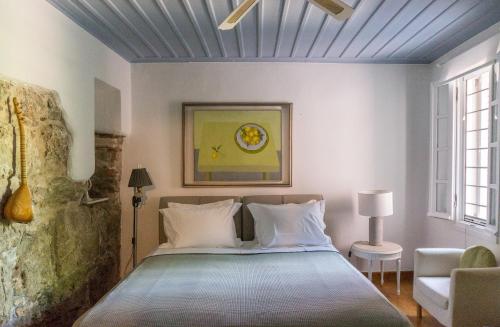 En eller flere senger på et rom på Acropolis Villa in Plaka