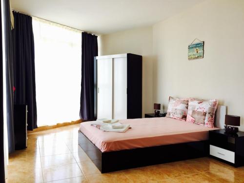 Кровать или кровати в номере PSB Deluxe Apartments Aheloy