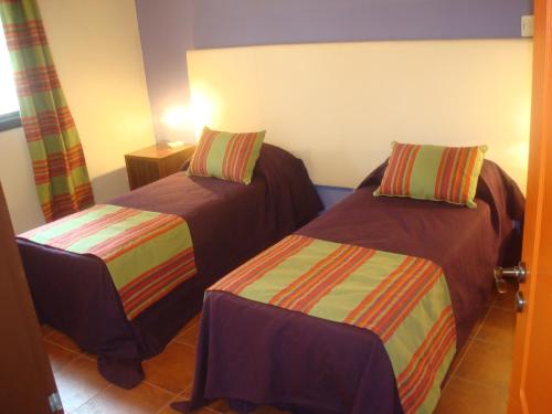 Кровать или кровати в номере El Solar De Los Olivos