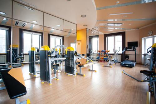 a gym with treadmills and cardio equipment in a building at Kaiserhof Hotel in Kaliningrad
